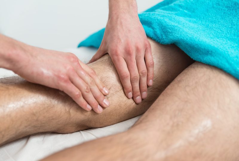Masseur Doing Massage On Man Body In The Spa Salon